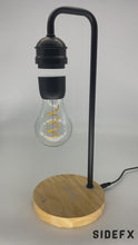 Load and play video in Gallery viewer, wireless charging, floating bedside light bulb
